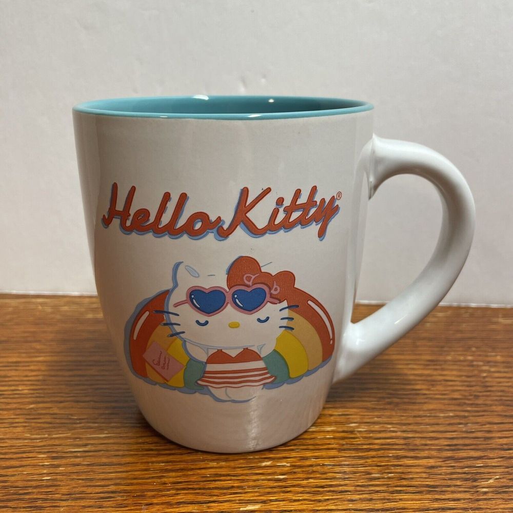 Hello‎ Kitty Coffee Mug Retro Heart Sunglasses Blue Interior White Ceramic